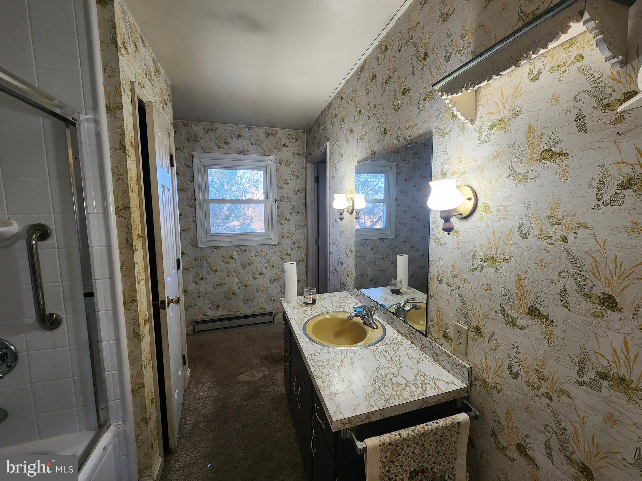 3734 Elizabethtown Road Manheim, PA 17545 - Photo 24 of 34 a bathroom with a granite countertop sink and a mirror