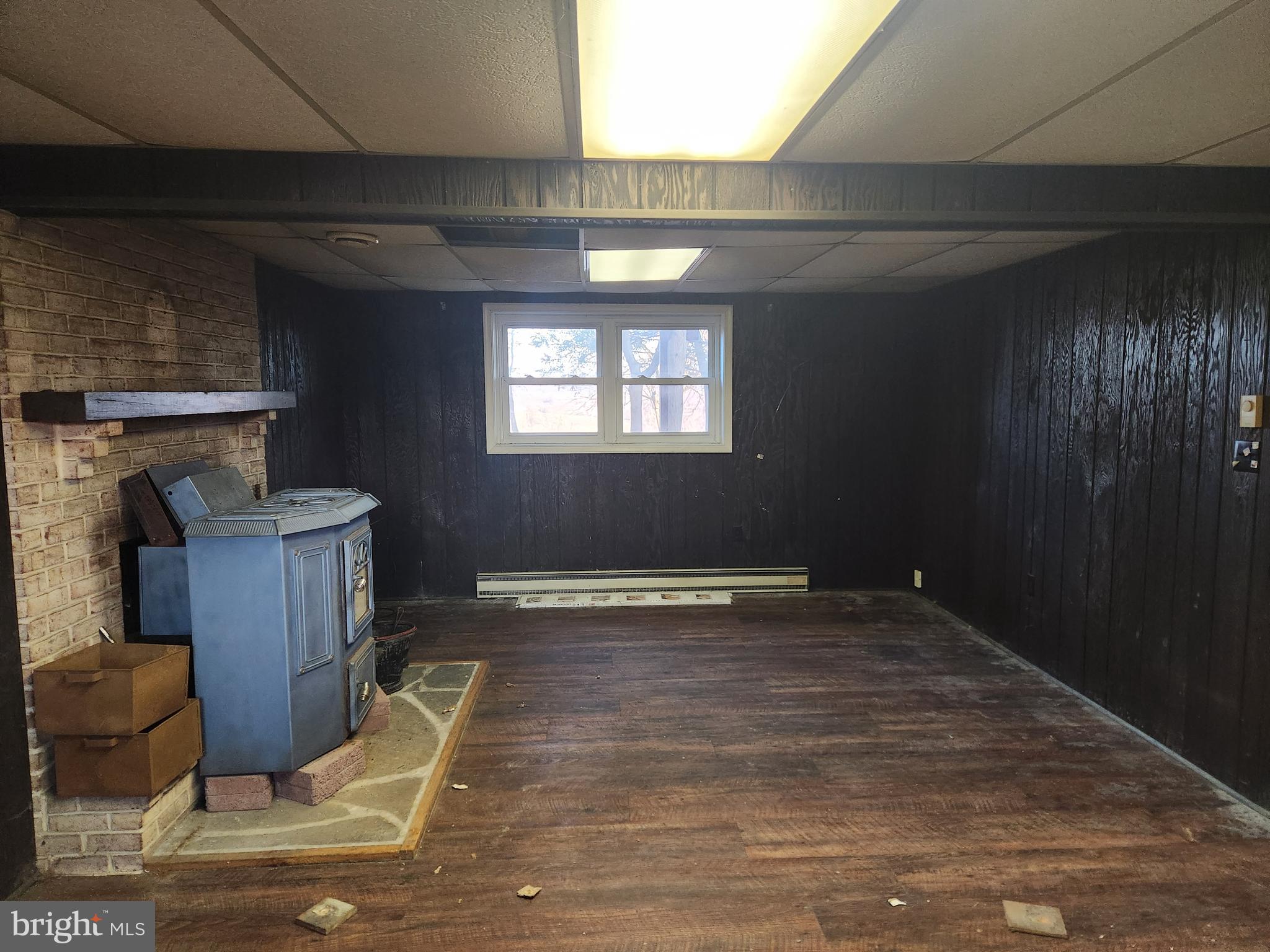 3734 Elizabethtown Road Manheim, PA 17545 - Photo 28 of 34 a view of an empty room with wooden floor and a window