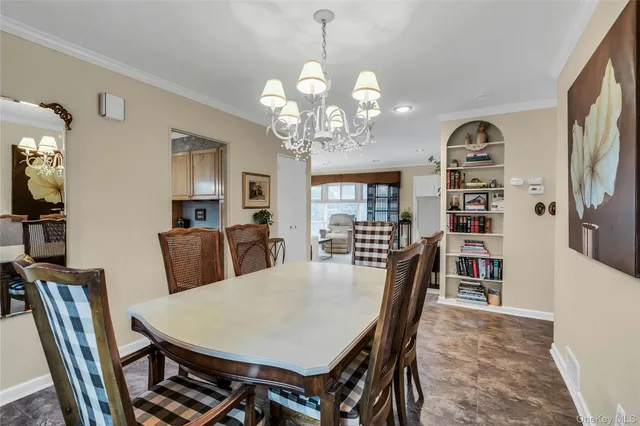 a view of a dining room with furniture