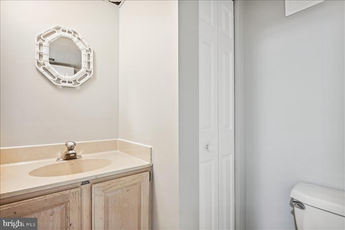115 Kingbrook Road Linthicum Heights, MD 21090 - Photo 18 of 72 a bathroom with a sink and a mirror