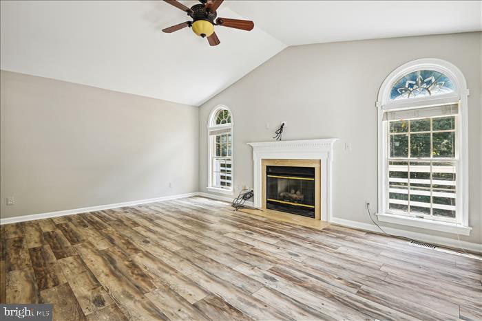 115 Kingbrook Road Linthicum Heights, MD 21090 - Photo 29 of 72 a view of an empty room with a fireplace and a window