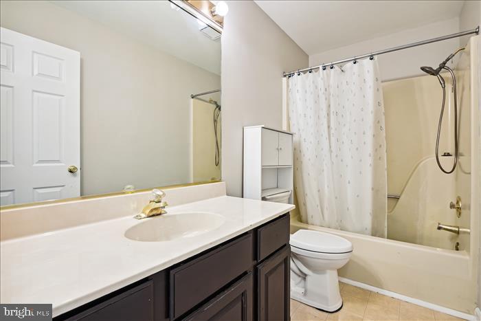 115 Kingbrook Road Linthicum Heights, MD 21090 - Photo 57 of 72 a bathroom with a sink toilet and shower