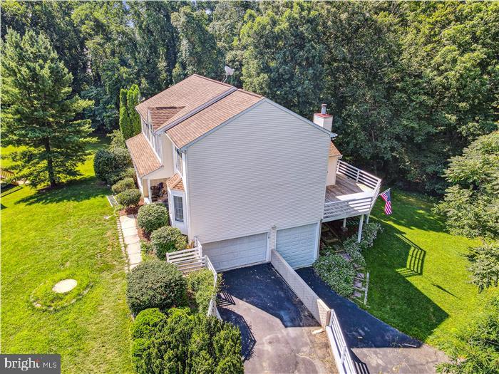 115 Kingbrook Road Linthicum Heights, MD 21090 - Photo 10 of 72 an aerial view of a house with a yard and trees