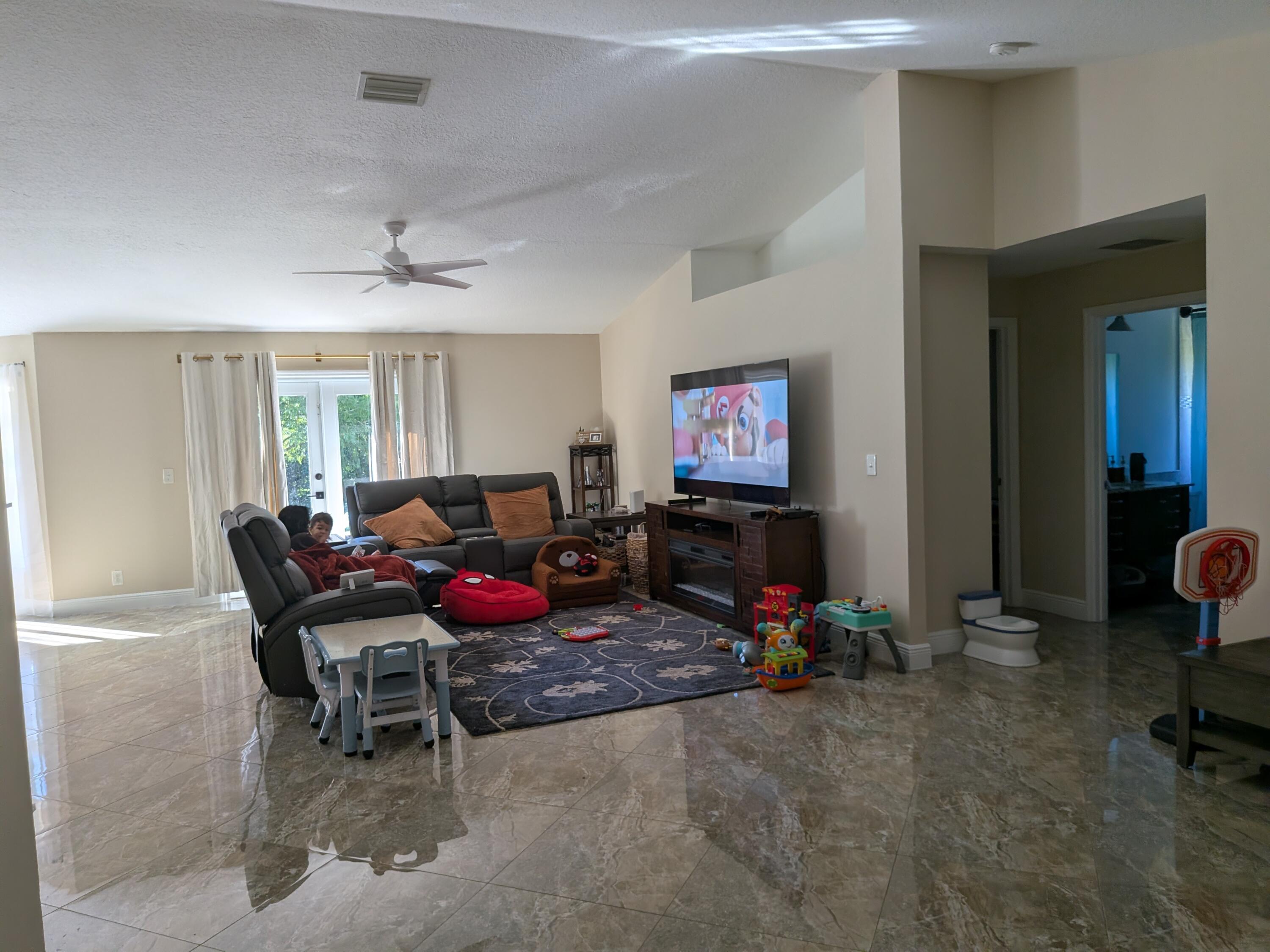 12810 57th Road North The Acreage, FL 33411 - Photo 11 of 34 PXL_20251207_143117275