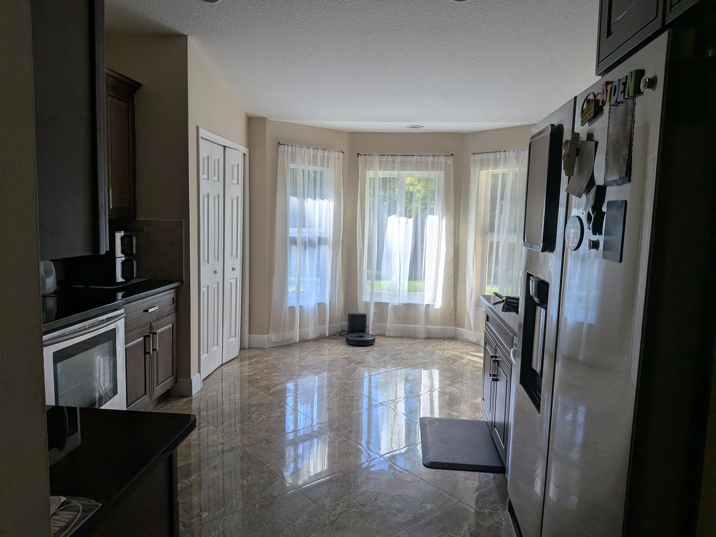 12810 57th Road North The Acreage, FL 33411 - Photo 13 of 34 PXL_20251207_143135417