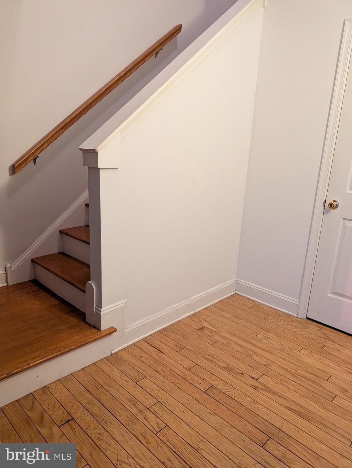 502 Keystone Alley, Unit 2 West Chester, PA 19382 - Photo 17 of 21 a view of a room with wooden floor and white walls