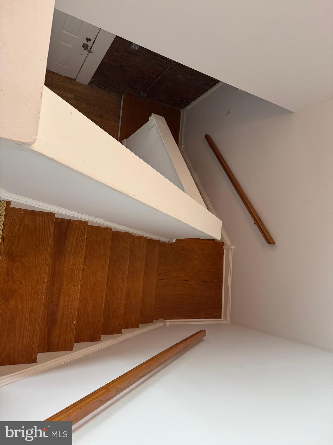 502 Keystone Alley, Unit 2 West Chester, PA 19382 - Photo 18 of 21 Inviting staircase with warm wooden tones.