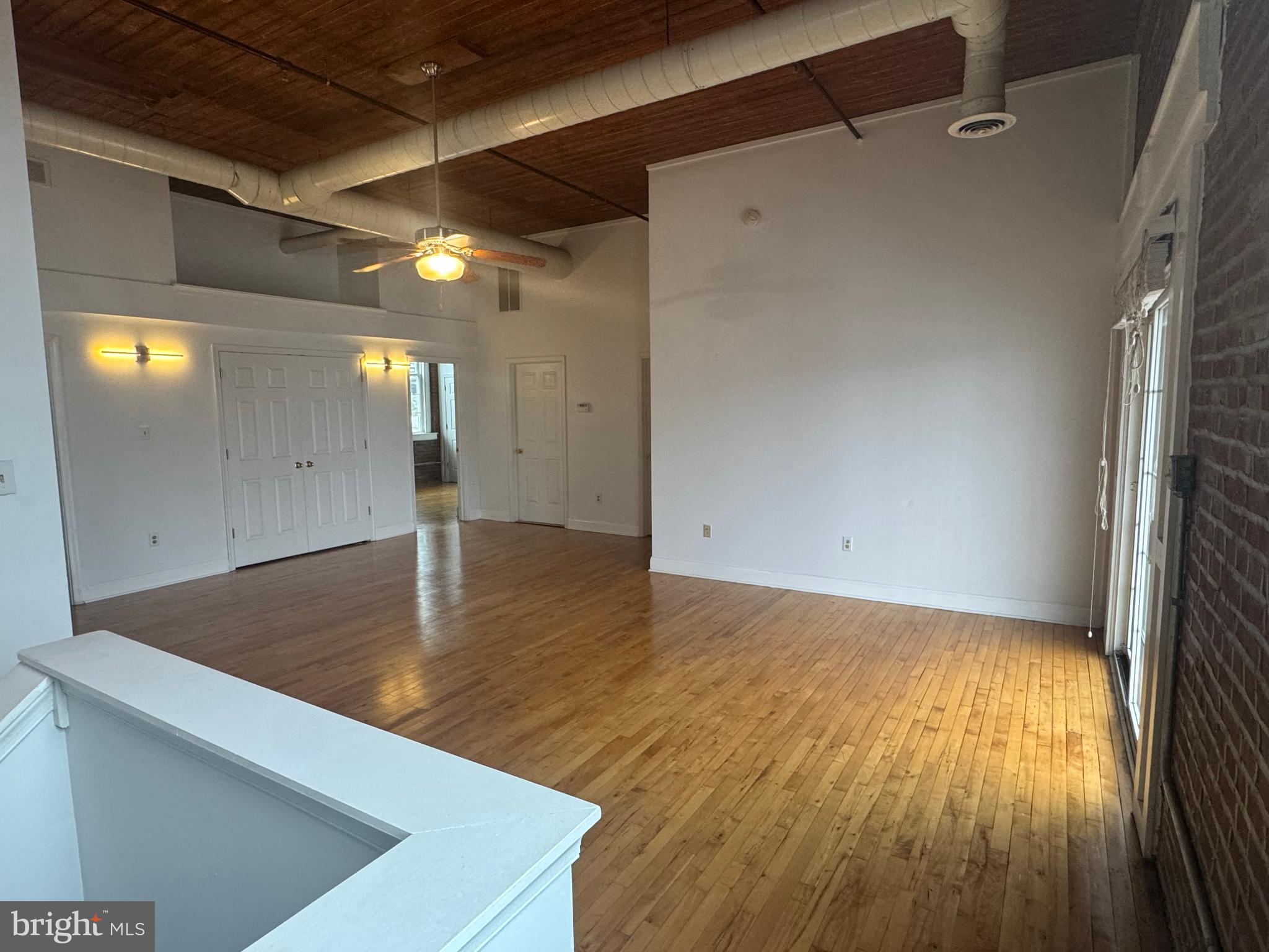 502 Keystone Alley, Unit 2 West Chester, PA 19382 - Photo 3 of 21 Spacious loft with warm wooden floors.