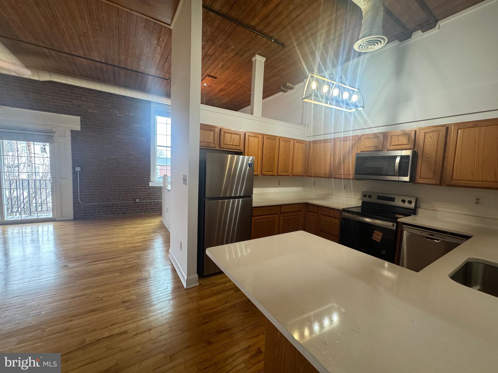 502 Keystone Alley, Unit 2 West Chester, PA 19382 - Photo 5 of 21 Stylish urban kitchen with modern finishes.