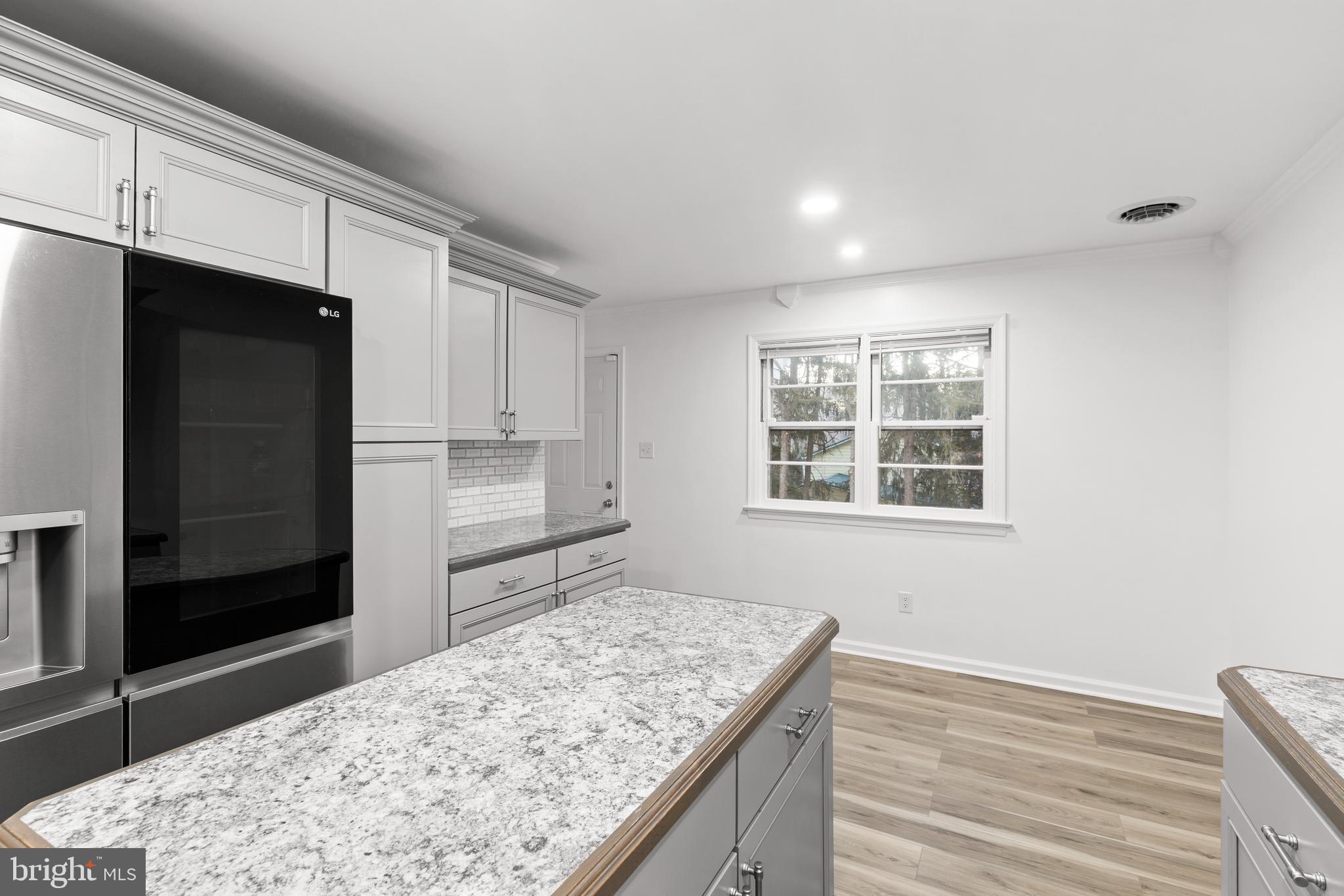 420 Stehman Church Road Millersville, PA 17551 - Photo 12 of 31 a kitchen with kitchen island window and refrigerator