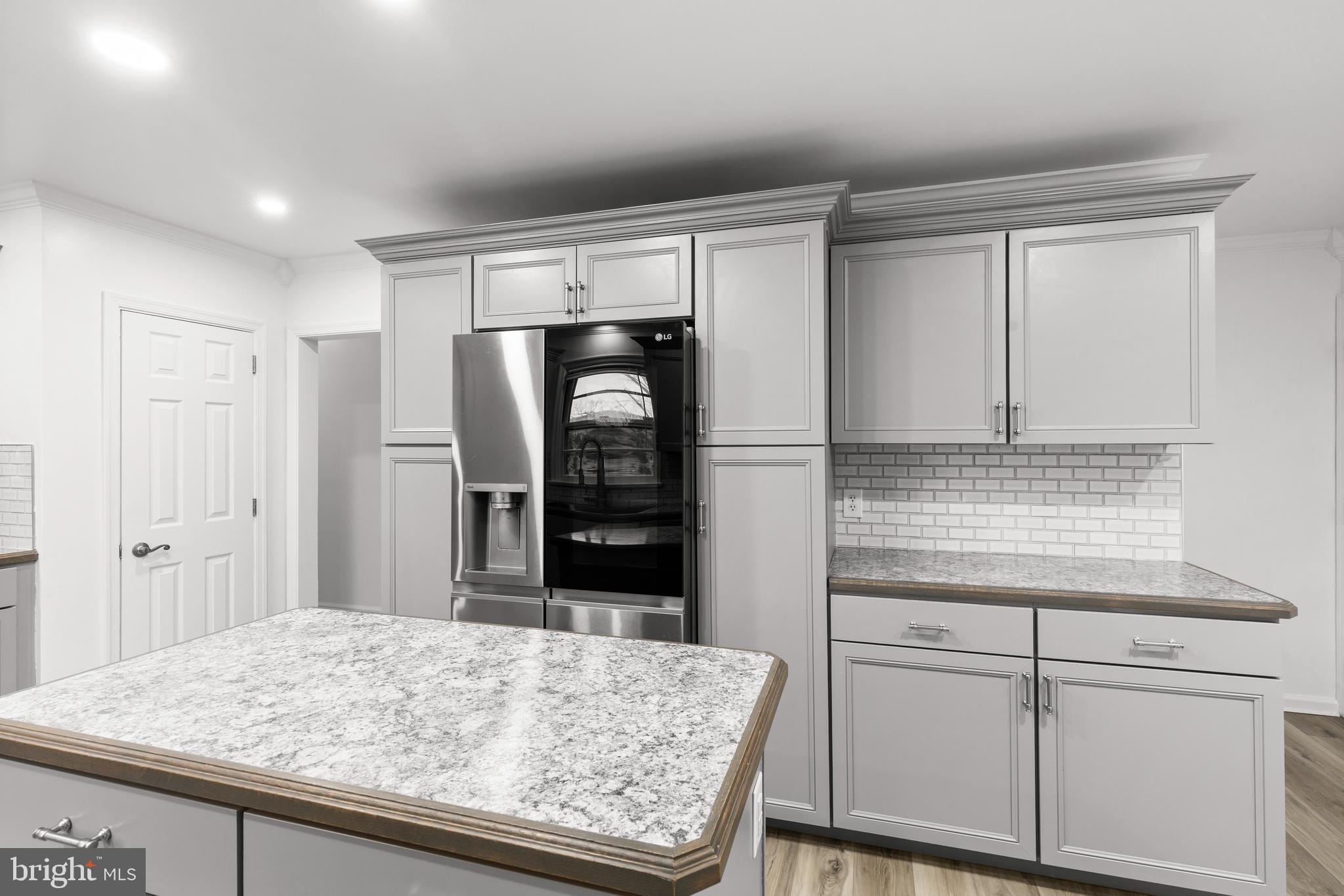 420 Stehman Church Road Millersville, PA 17551 - Photo 13 of 31 a kitchen with kitchen island sink refrigerator and cabinets