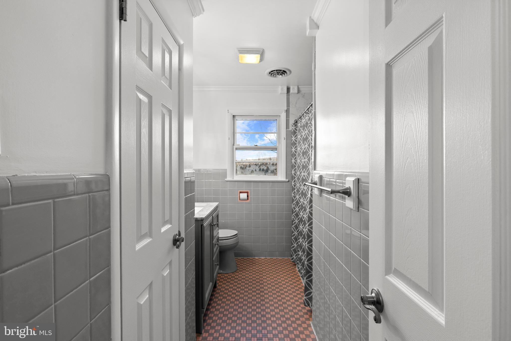 420 Stehman Church Road Millersville, PA 17551 - Photo 14 of 31 a bathroom with a toilet and a shower