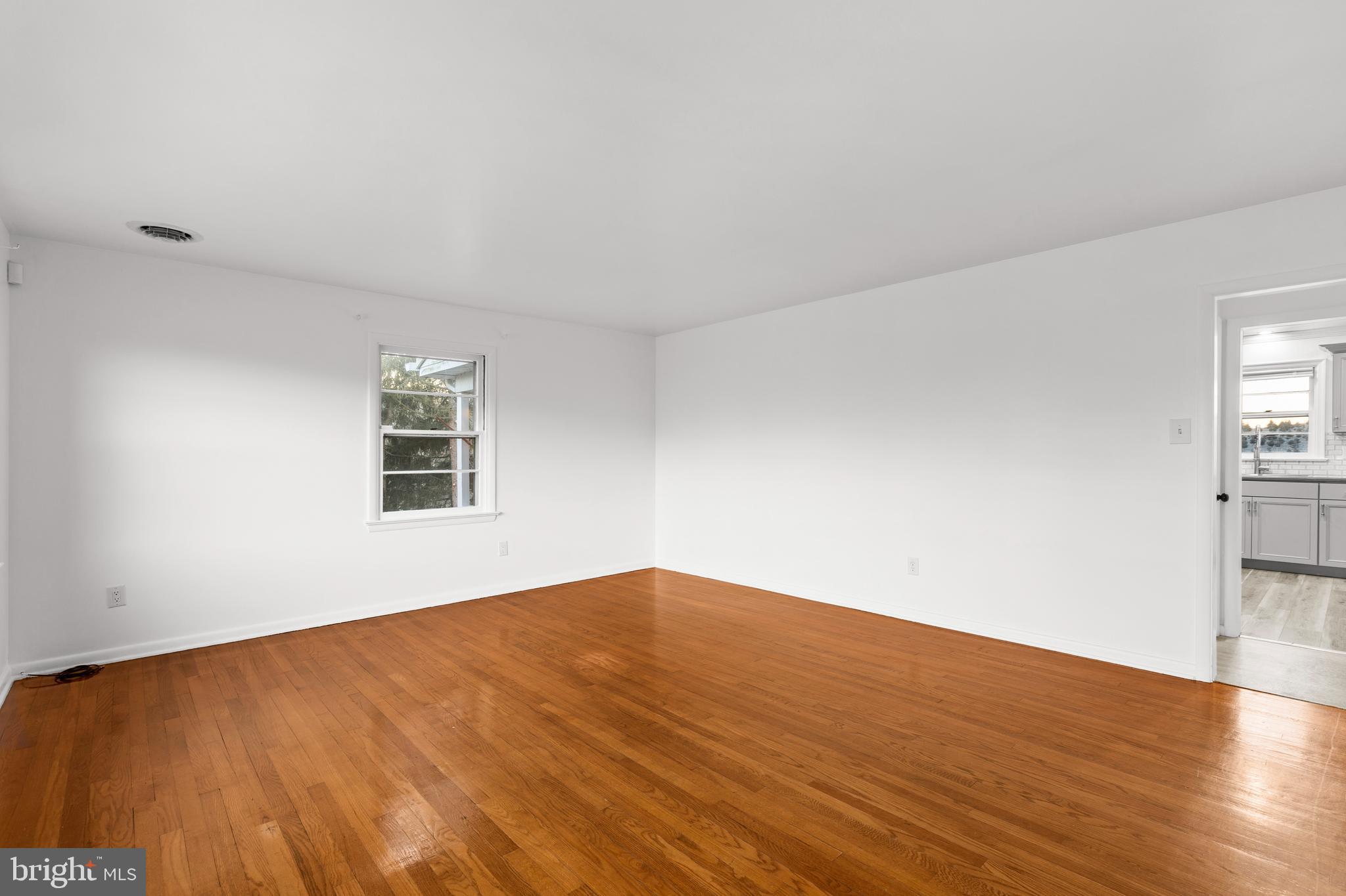 420 Stehman Church Road Millersville, PA 17551 - Photo 20 of 31 a view of empty room with wooden floor and fan