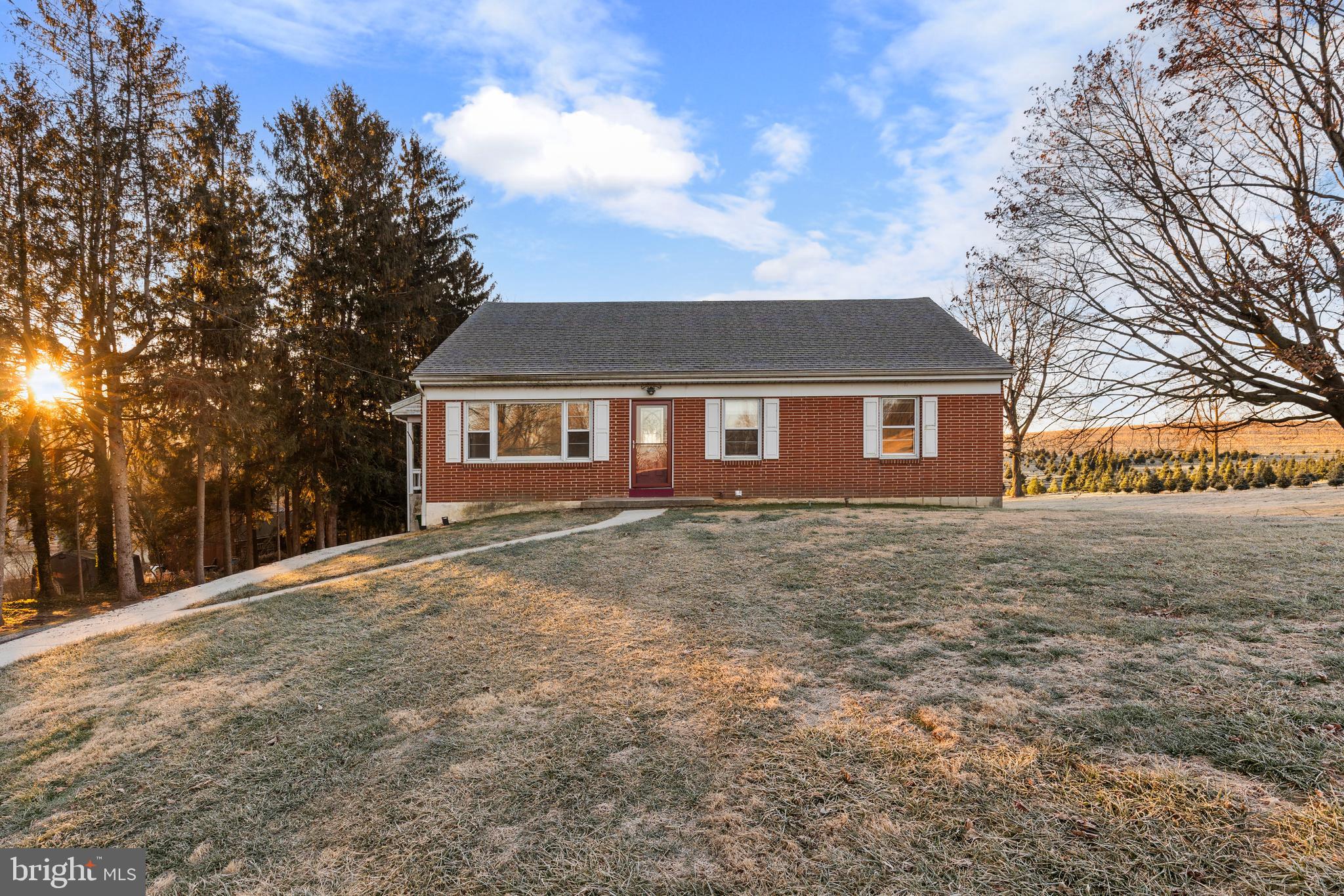 420 Stehman Church Road Millersville, PA 17551 - Photo 2 of 31 a view of a yard in front of a house with large trees