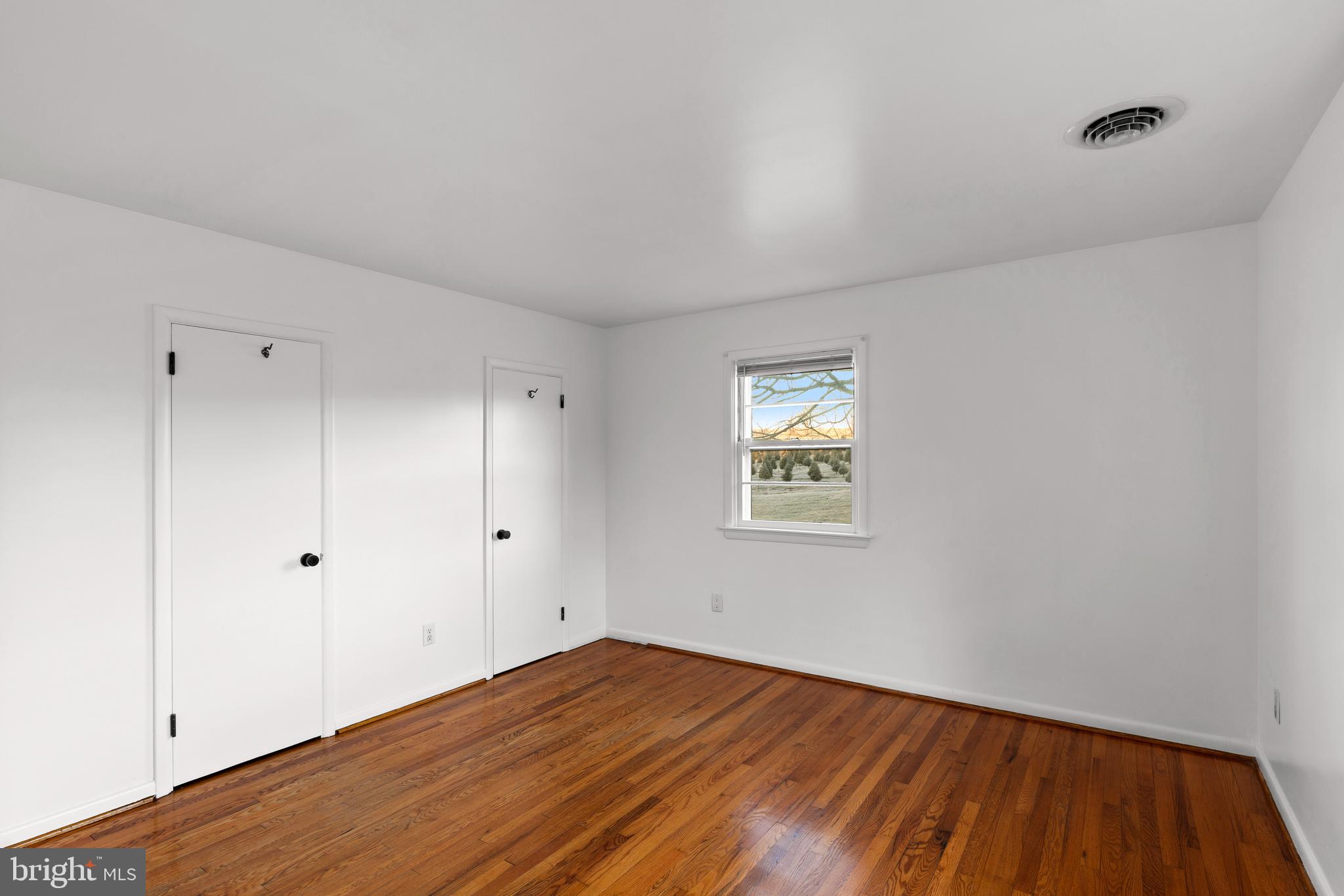 420 Stehman Church Road Millersville, PA 17551 - Photo 23 of 31 a view of empty room with wooden floor and fan