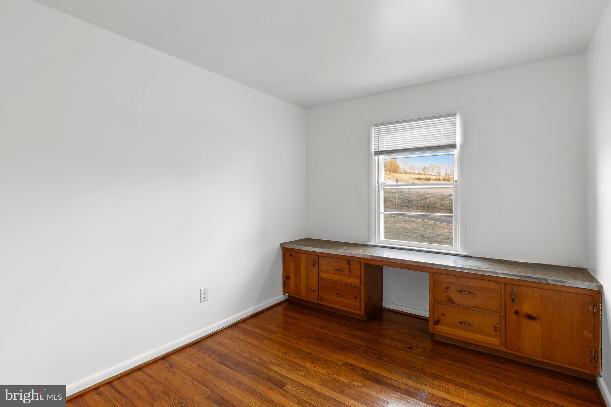 420 Stehman Church Road Millersville, PA 17551 - Photo 27 of 31 a room with wooden floor and cabinet