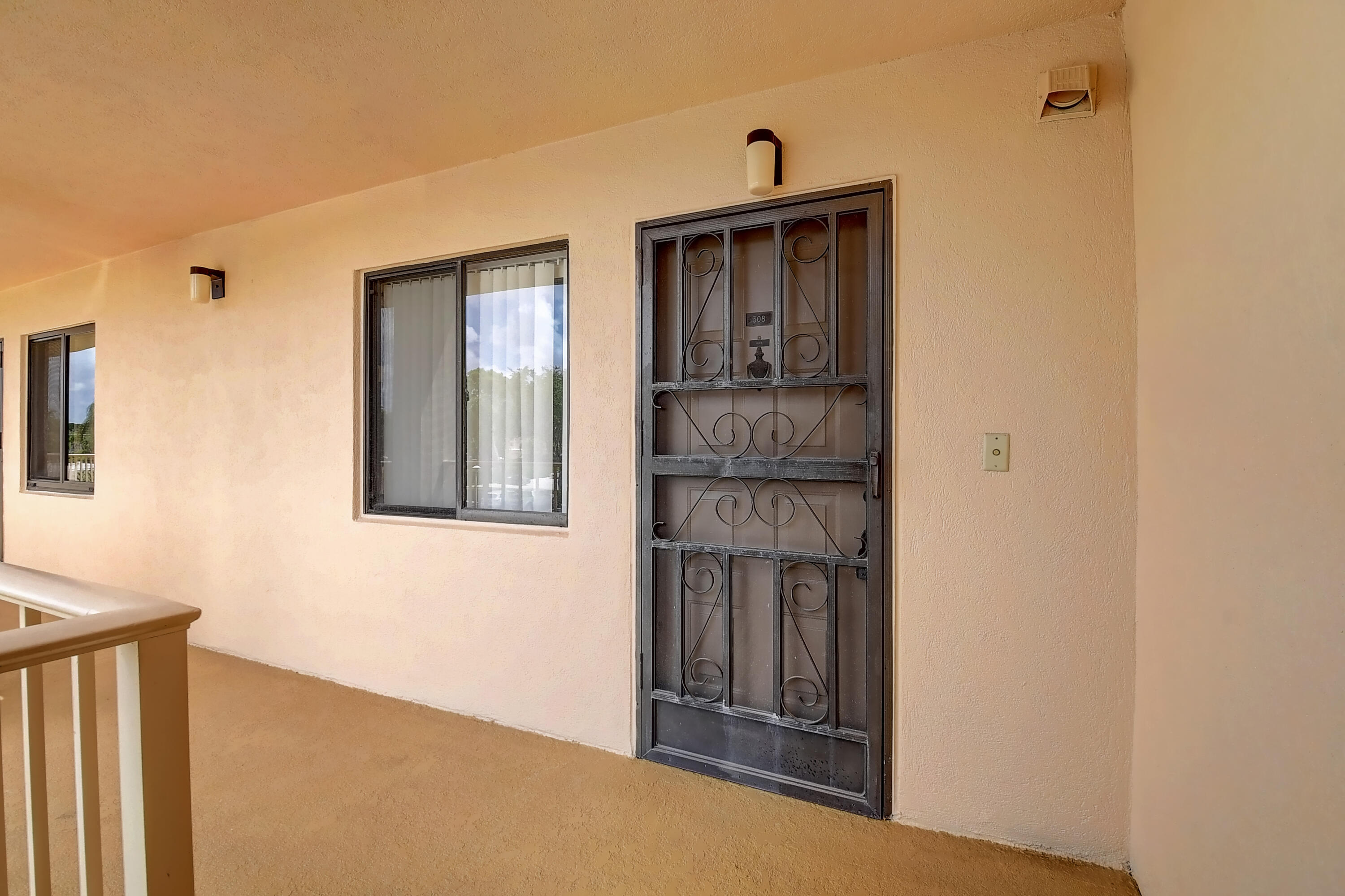7076 Huntington Lane, Unit 802 Delray Beach, FL 33446 - Photo 2 of 54 Front door to apt 802