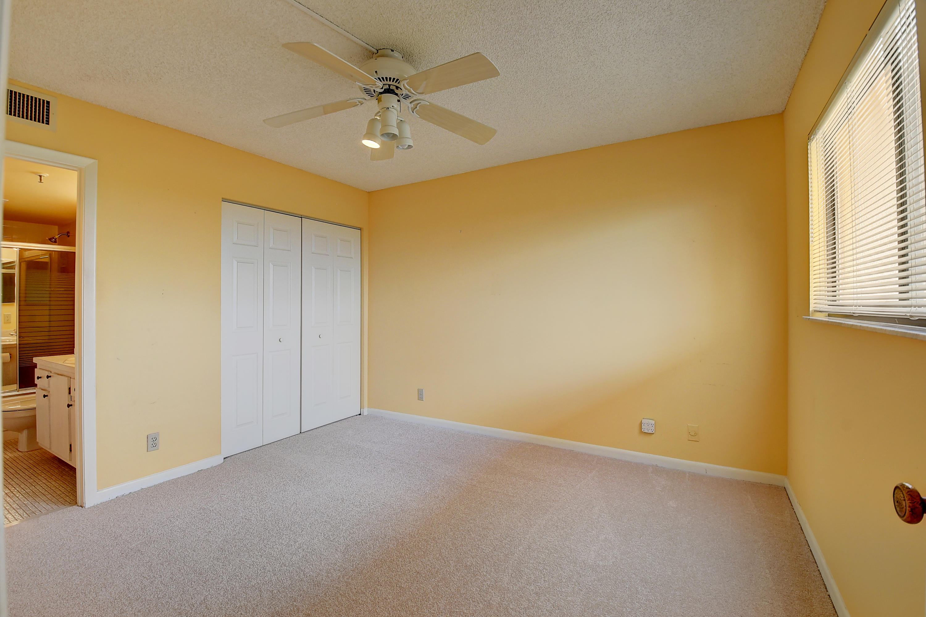 7076 Huntington Lane, Unit 802 Delray Beach, FL 33446 - Photo 21 of 54 2nd bedroom with new carpeting