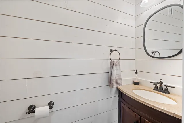 a living room with furniture fireplace and window