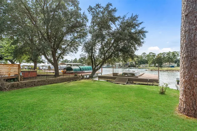 a view of a house with a yard porch and sitting area