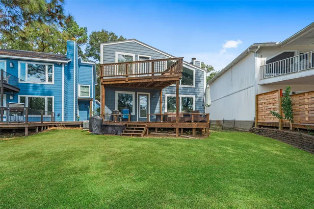 a view of a house with a yard porch and sitting area