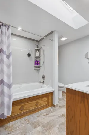 a room with a sink and cabinets