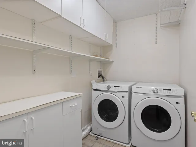 a view of a house with a tree