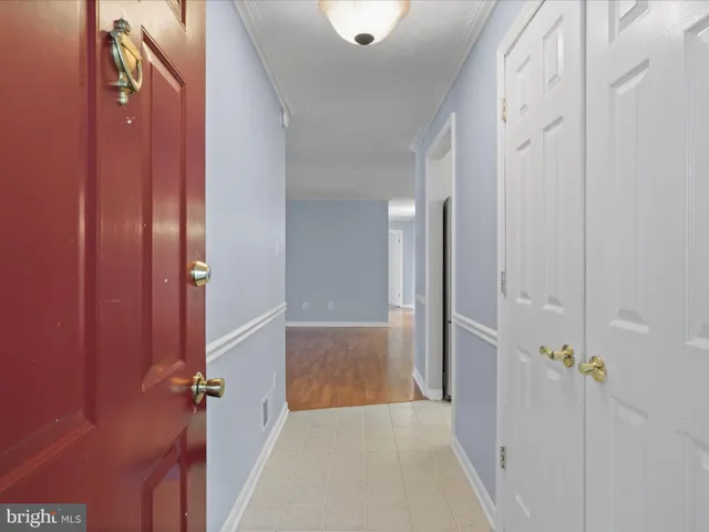 a view of an entryway with a chandelier