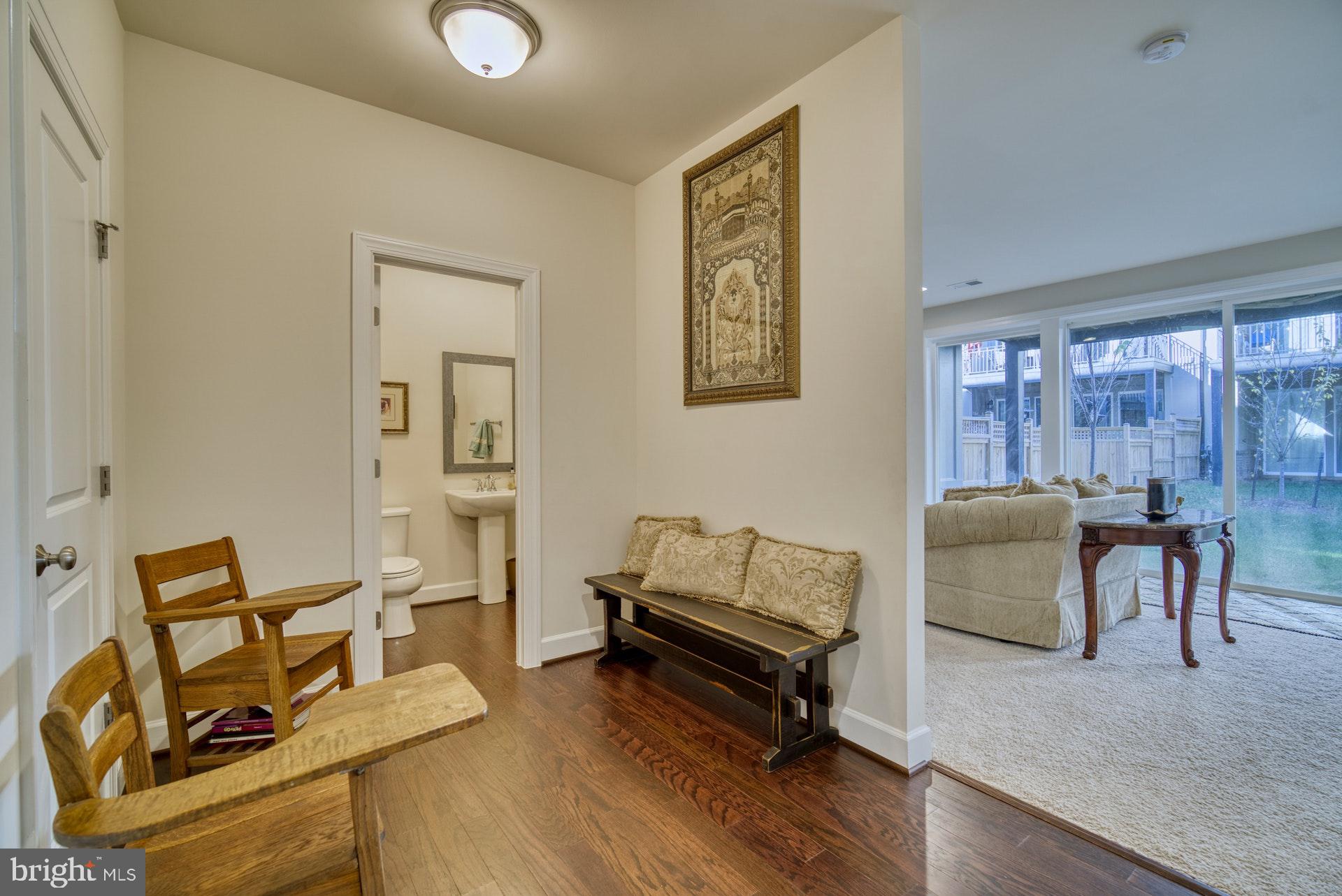 42288 Porter Ridge Terrace Brambleton, VA 20148 - Photo 25 of 30 Spacious Mud room with hard wood floors