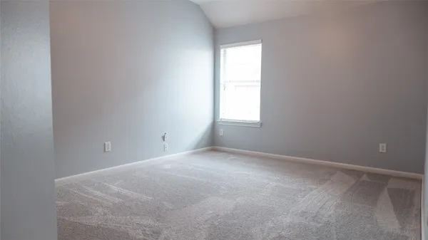 a view of empty room with a window