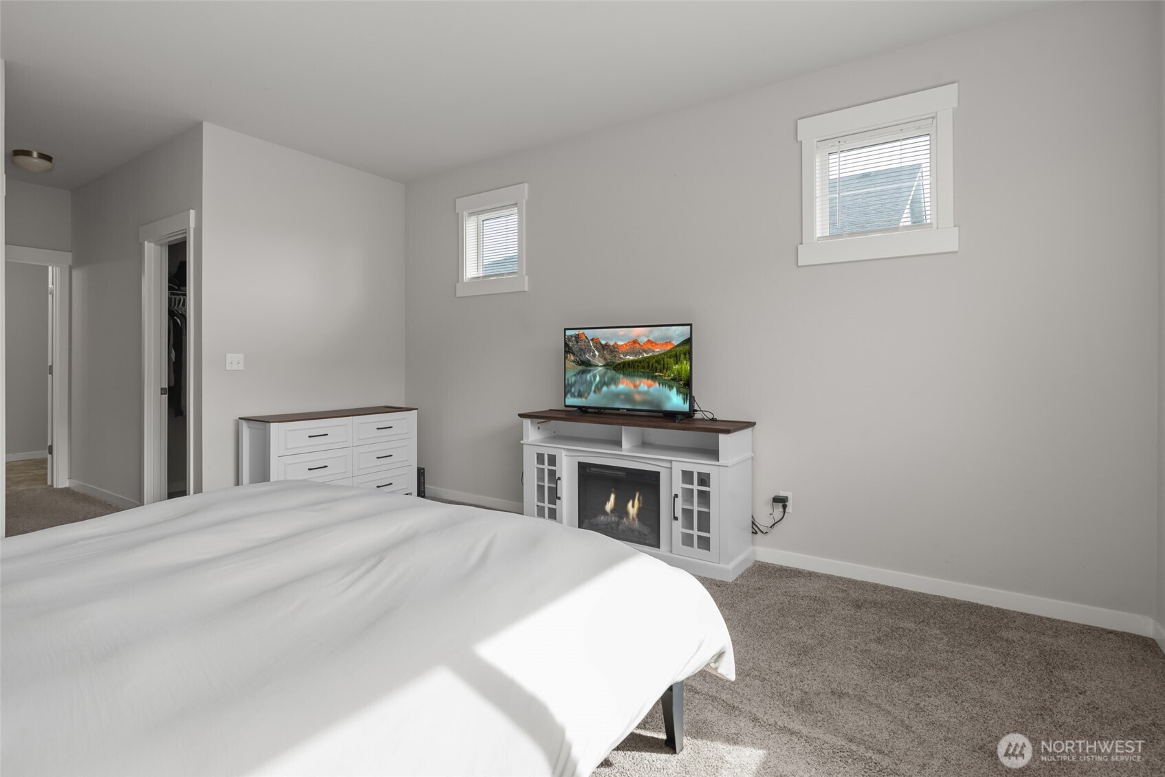 1768 East Rio Vista Avenue Burlington, WA 98233 - Photo 16 of 37 a bedroom with a bed and a tv