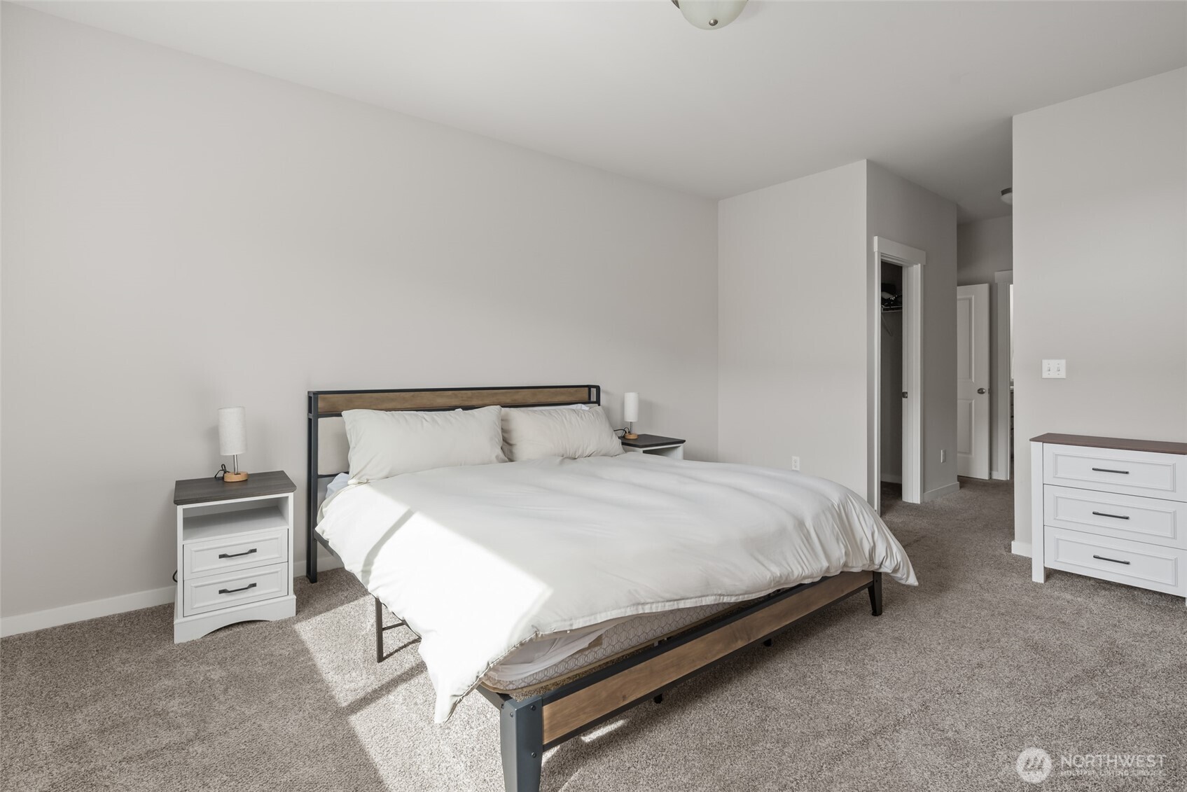 1768 East Rio Vista Avenue Burlington, WA 98233 - Photo 17 of 37 a bedroom with a bed and a dresser