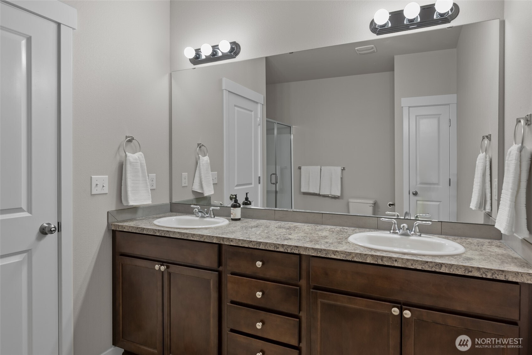 1768 East Rio Vista Avenue Burlington, WA 98233 - Photo 18 of 37 a bathroom with a granite countertop sink double and mirror