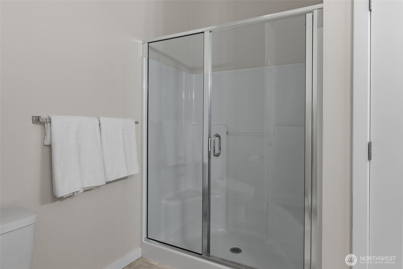 1768 East Rio Vista Avenue Burlington, WA 98233 - Photo 19 of 37 a bathroom with a glass shower door