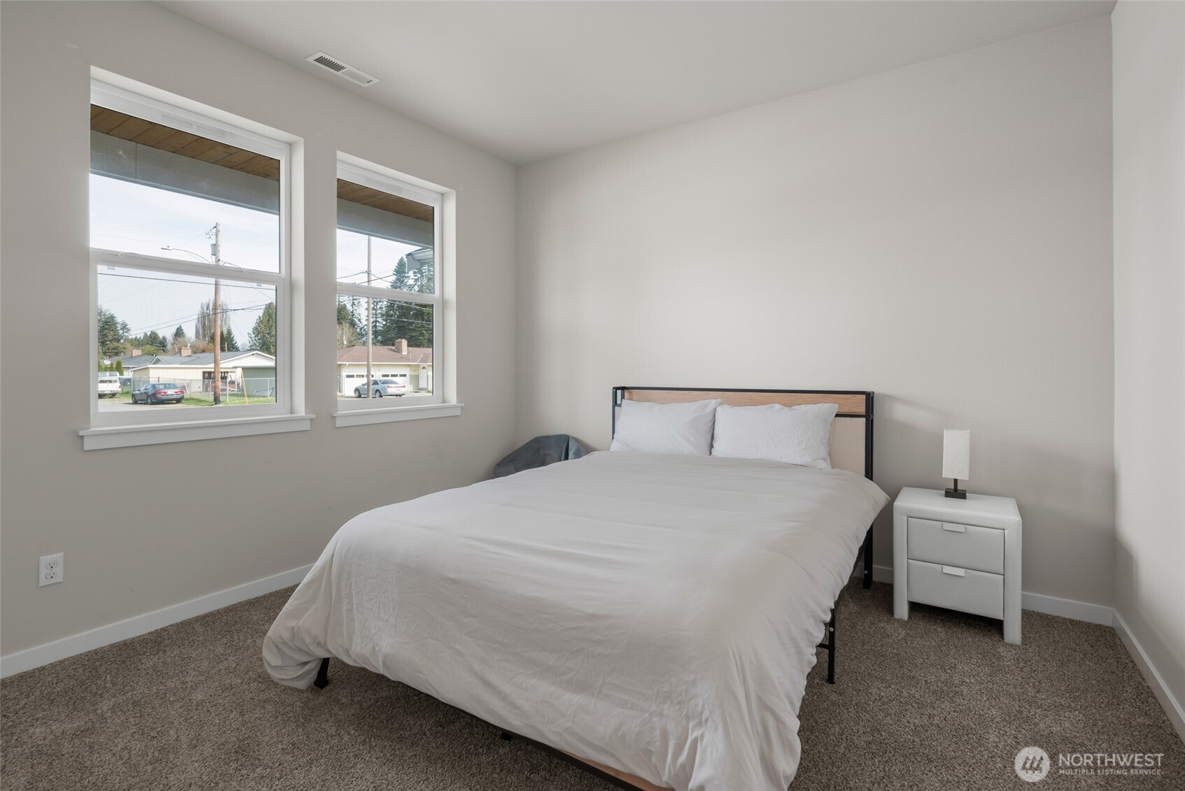 1768 East Rio Vista Avenue Burlington, WA 98233 - Photo 20 of 37 a bedroom with a bed and window