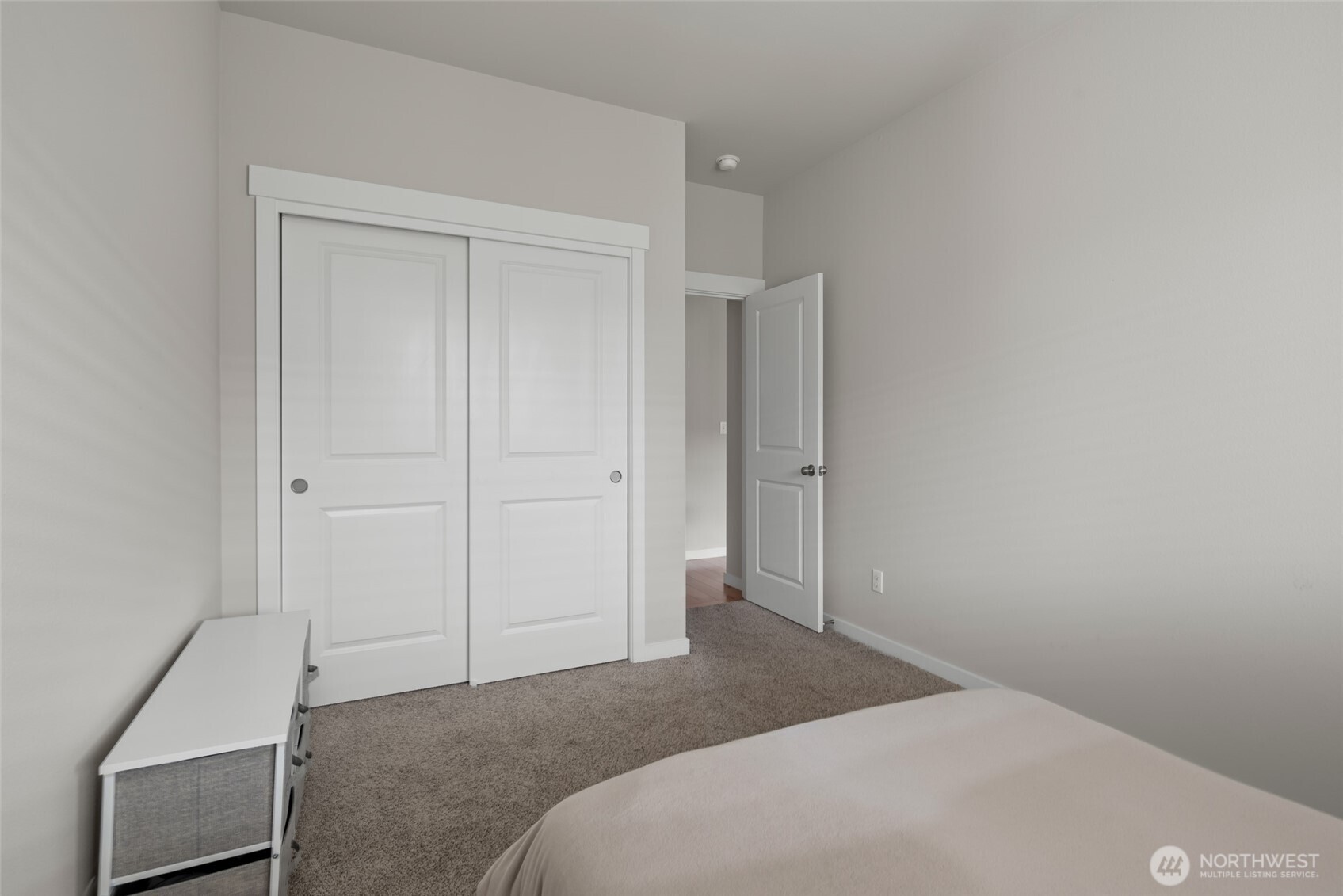 1768 East Rio Vista Avenue Burlington, WA 98233 - Photo 24 of 37 a bedroom with a bed and a cabinets