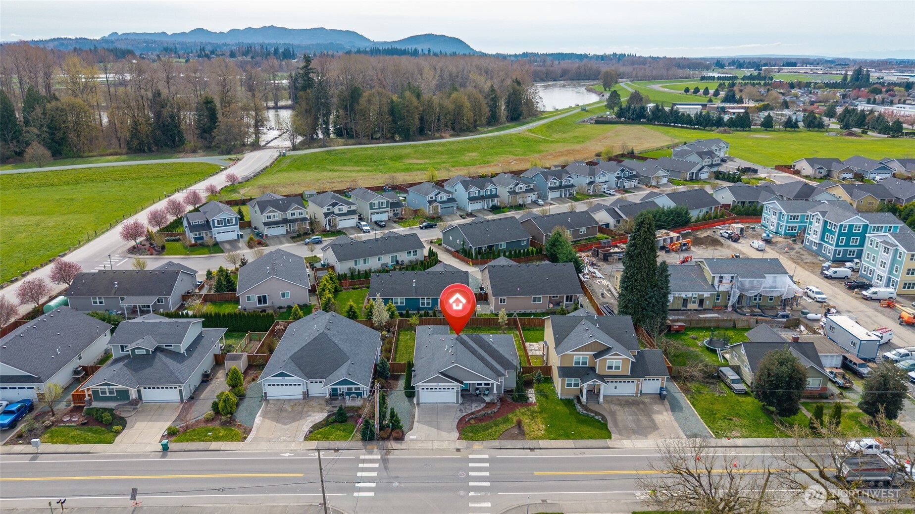 1768 East Rio Vista Avenue Burlington, WA 98233 - Photo 35 of 37 an aerial view of a house with a garden and lake view
