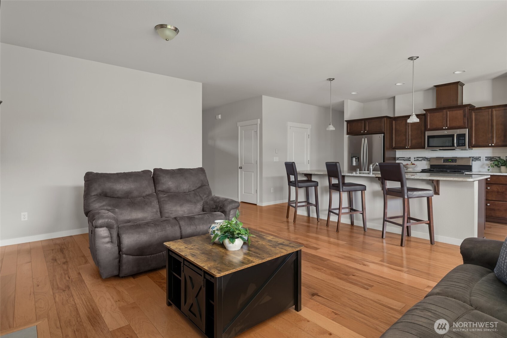 1768 East Rio Vista Avenue Burlington, WA 98233 - Photo 7 of 37 a living room with furniture and a kitchen view