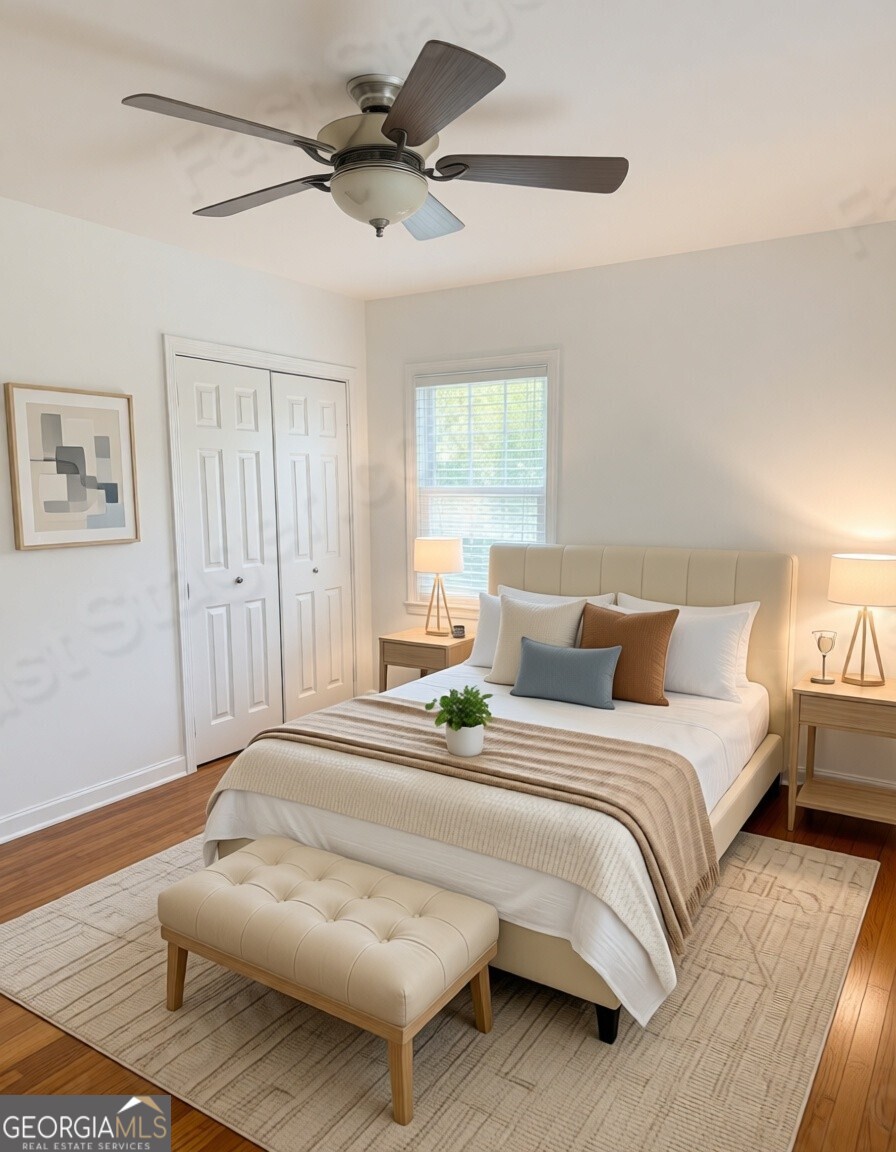1875 Brewer Boulevard Southwest Atlanta, GA 30310 - Photo 15 of 15 a bedroom with bed and window