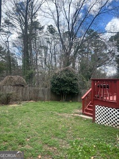 1875 Brewer Boulevard Southwest Atlanta, GA 30310 - Photo 10 of 15 a view of a bench in a backyard