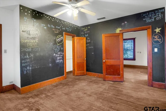 a view of gallery with front door