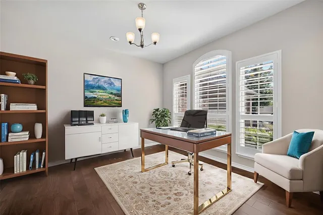 a workspace with furniture and window