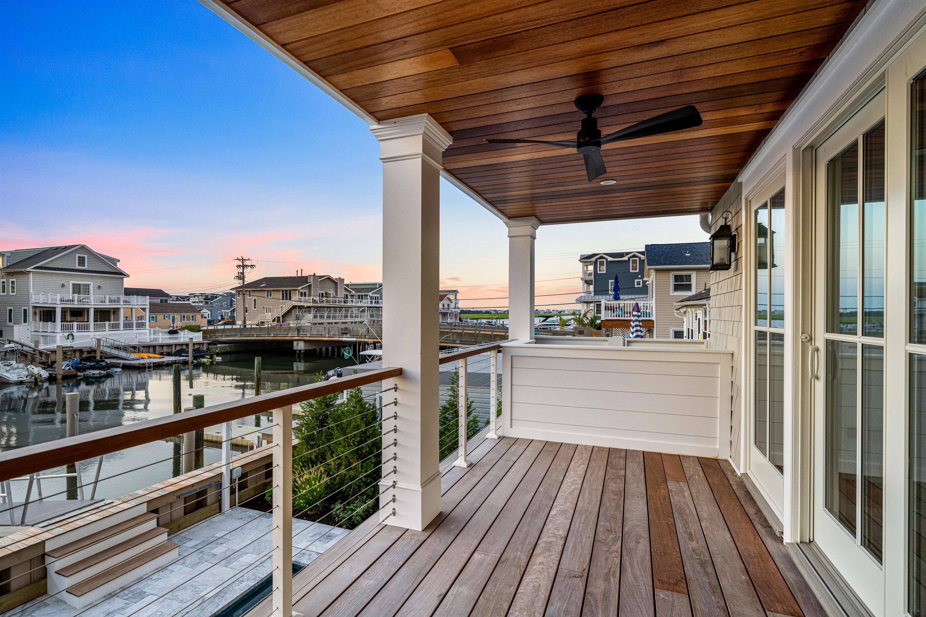 2148 Ocean, Unit 2148 Avalon, NJ 08202 - Photo 14 of 40 a view of a balcony with wooden floor