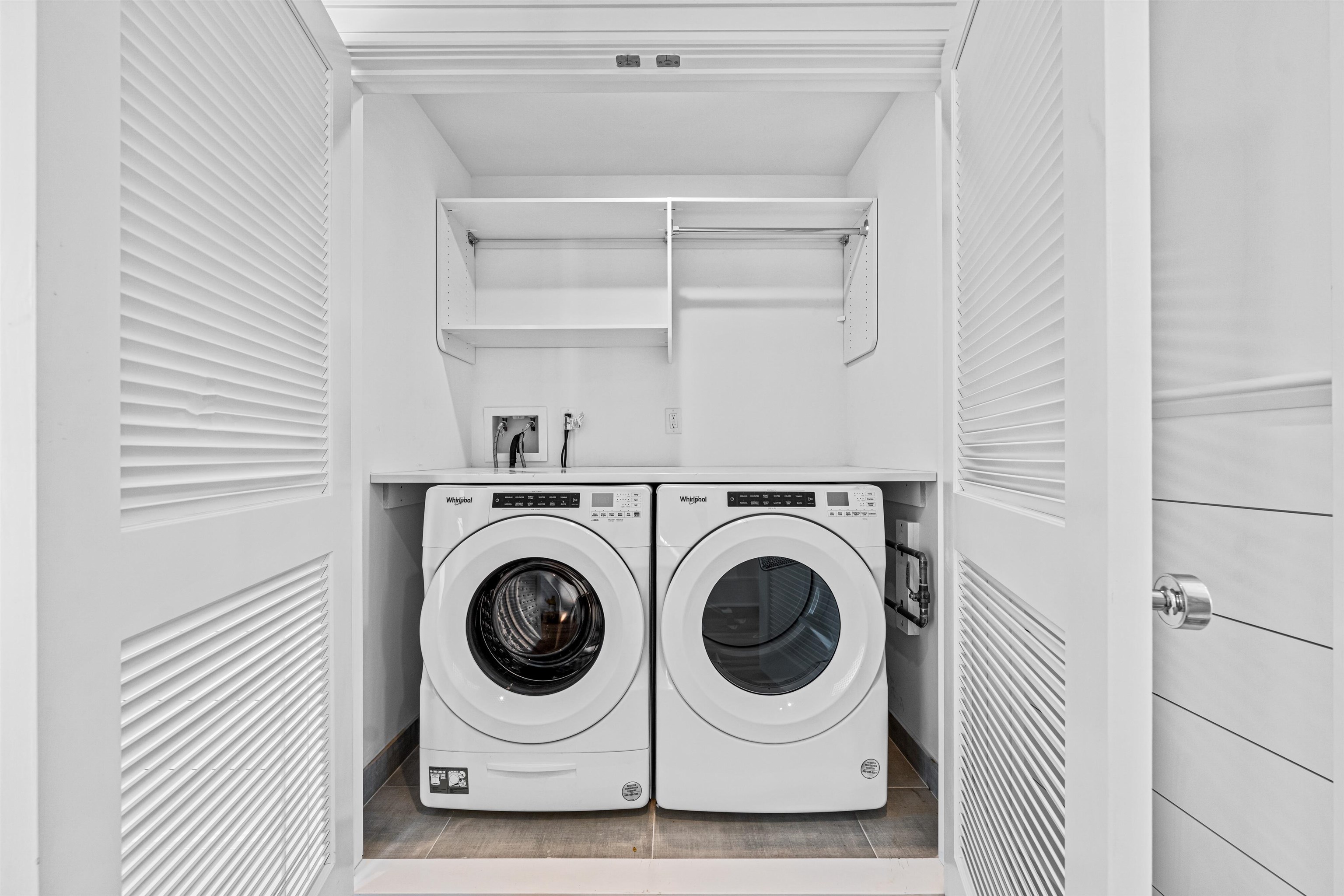 2148 Ocean, Unit 2148 Avalon, NJ 08202 - Photo 15 of 40 a utility room with dryer and washer
