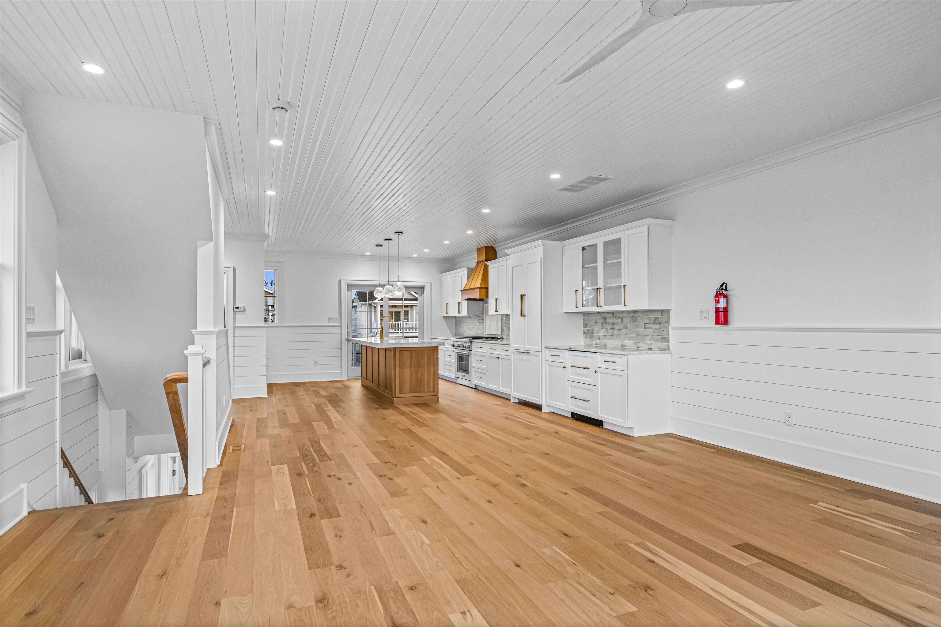 2148 Ocean, Unit 2148 Avalon, NJ 08202 - Photo 25 of 40 a view of kitchen and kitchen island wooden floor