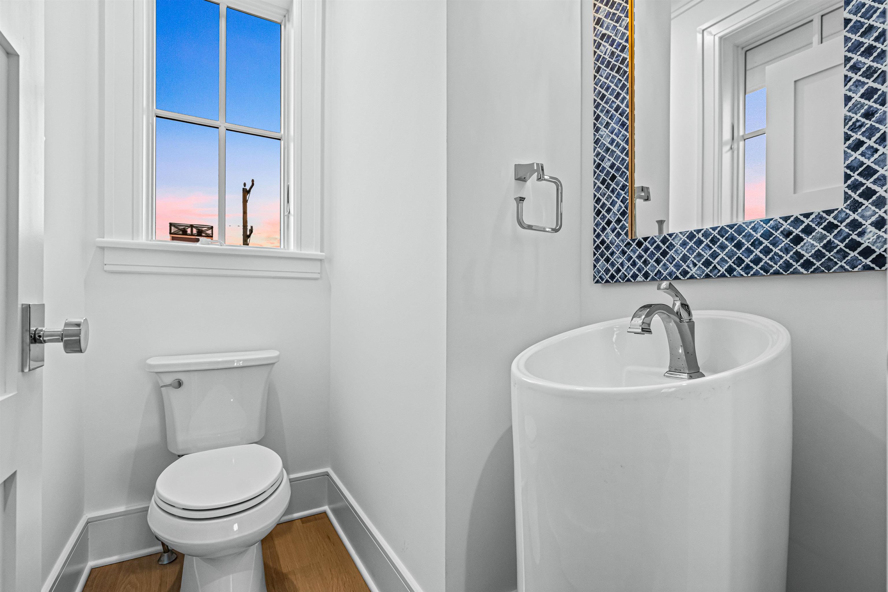 2148 Ocean, Unit 2148 Avalon, NJ 08202 - Photo 28 of 40 a bathroom with a toilet sink and mirror
