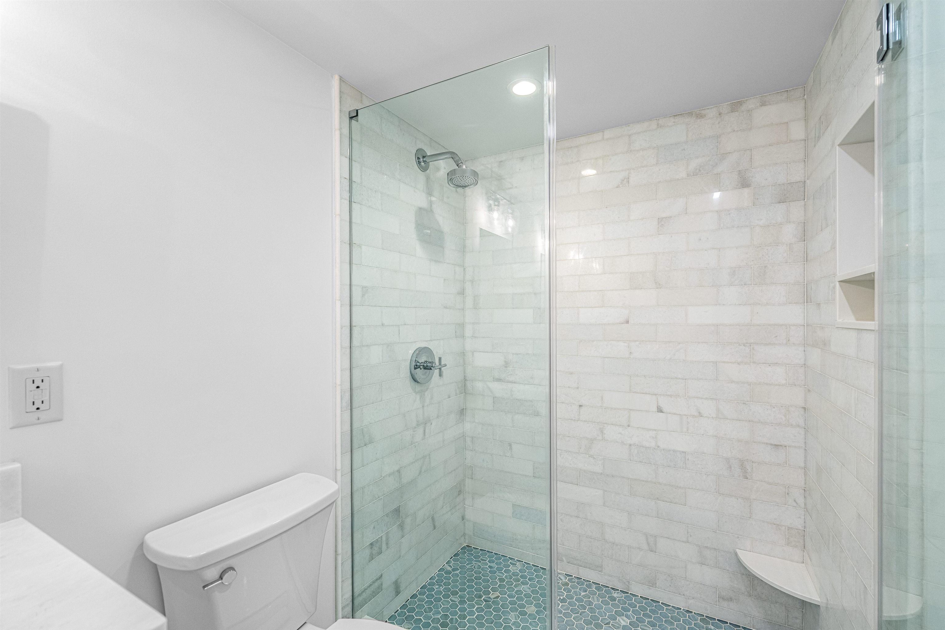 2148 Ocean, Unit 2148 Avalon, NJ 08202 - Photo 33 of 40 a bathroom with a shower and a toilet