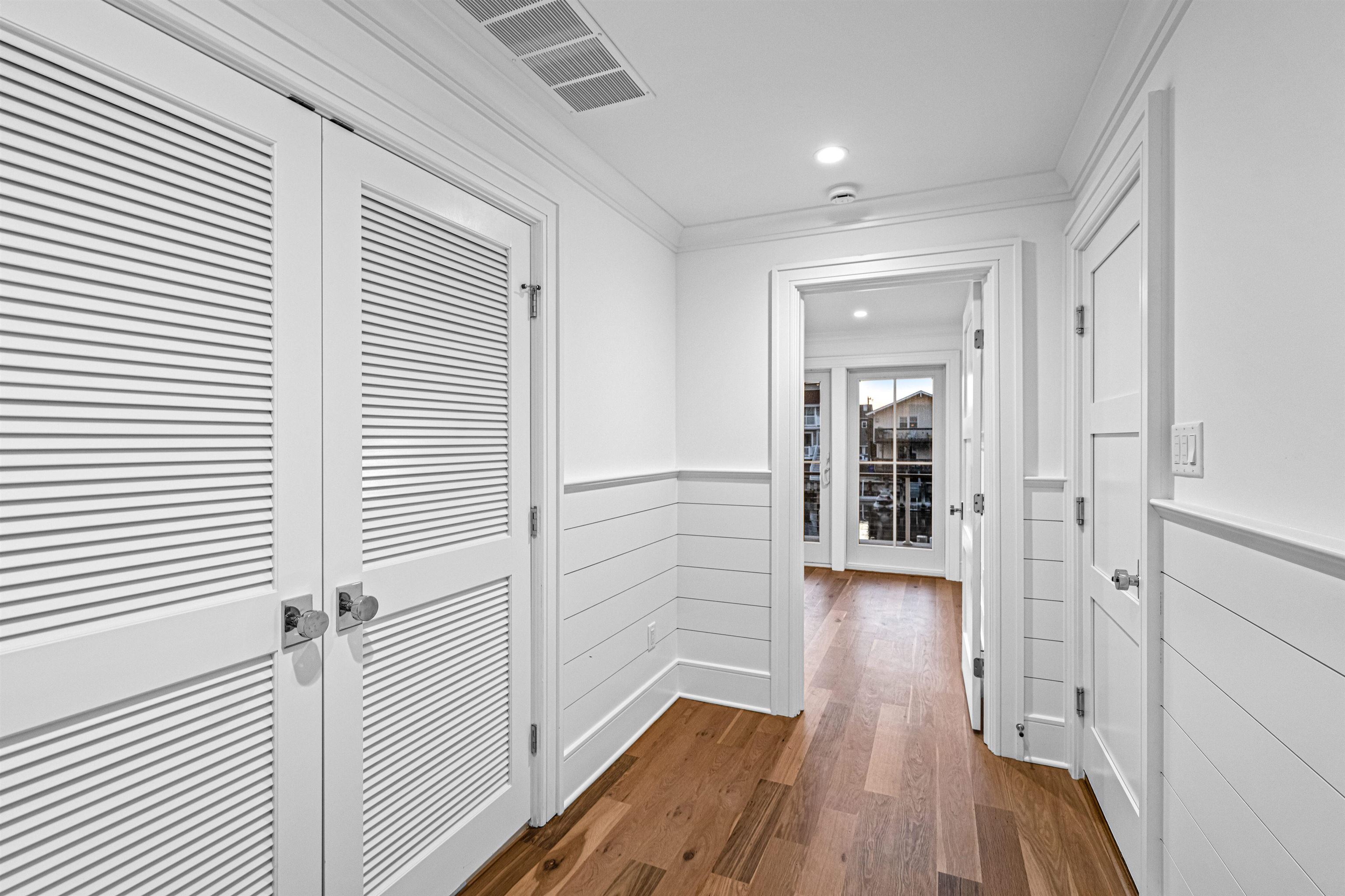 2148 Ocean, Unit 2148 Avalon, NJ 08202 - Photo 5 of 40 a view of a hallway with wooden floor
