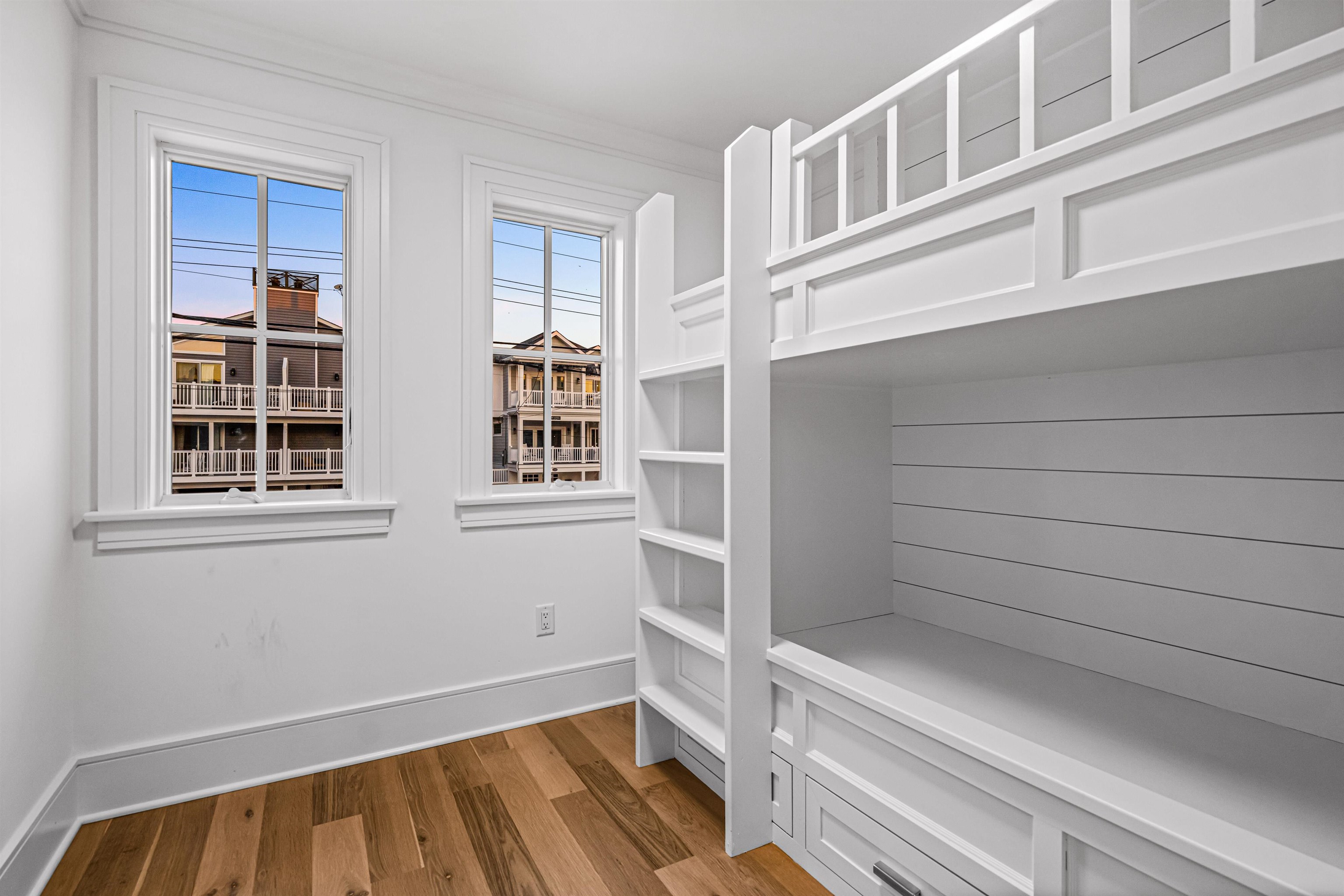 2148 Ocean, Unit 2148 Avalon, NJ 08202 - Photo 6 of 40 a view of walk in closet with empty racks