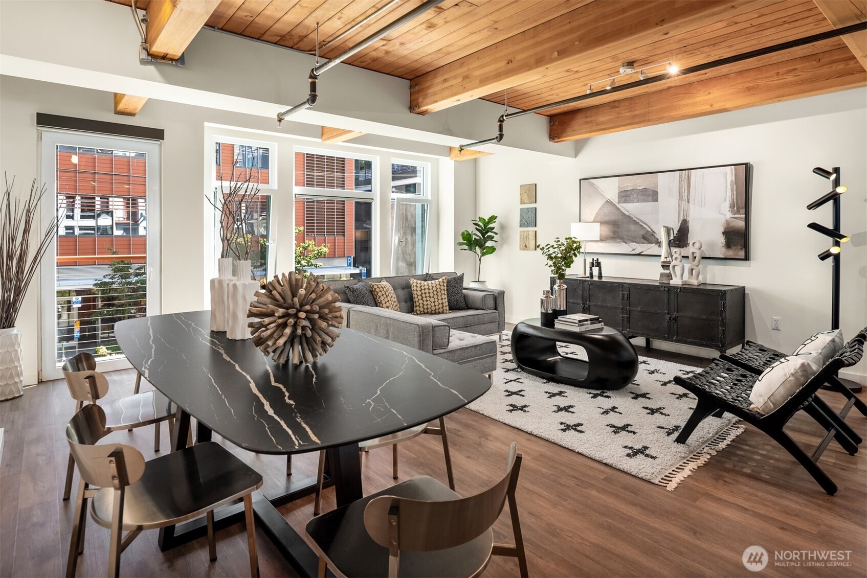 401 9th Avenue North, Unit 210 Seattle, WA 98109 - Photo 16 of 30 a view of a dining room with furniture window and outside view